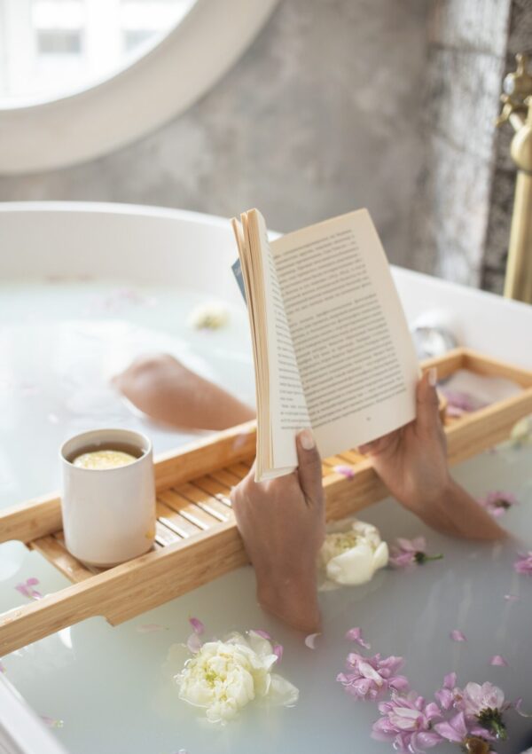 Atomic Habits, reading a book in the bathtub